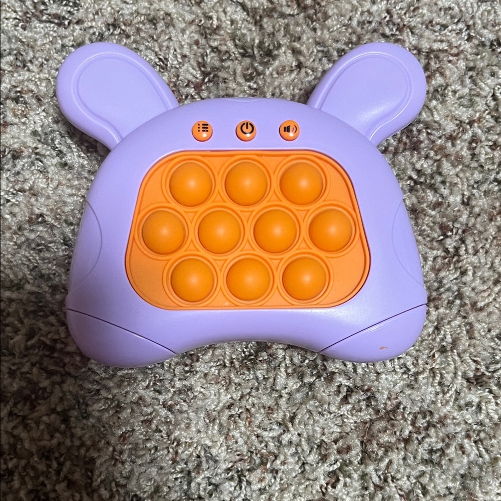 Purple and Orange Pop Toy